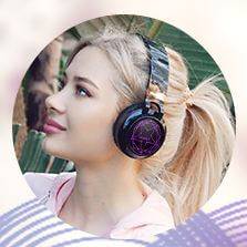 Teenage girl wearing Riwbox WT-8S Bluetooth Headphones.