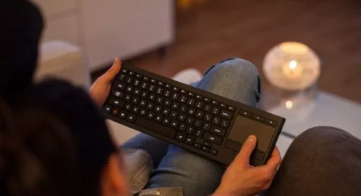 holding wireless keyboard